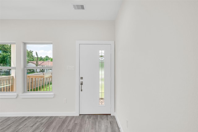 8022 Yoe St, Houston, TX 77078 - foyer featuring wood finished floors and baseboards