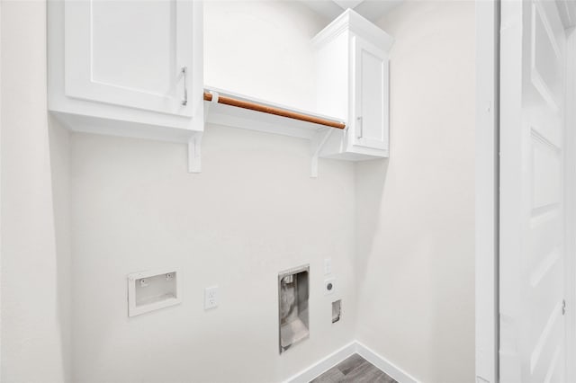 8022 Yoe St, Houston, TX 77078 - washroom with electric dryer hookup, cabinet space, hookup for a washing machine, and wood finished floors
