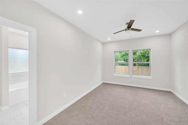 8022 Yoe St, Houston, TX 77078 - empty room with a ceiling fan, recessed lighting, and carpet floors