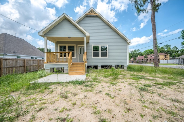8022 Yoe St, Houston, TX 77078 - rear view of property with a porch