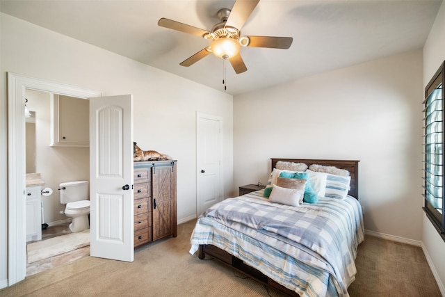 9 Copper Bottom Dr, Tomball, TX 77377 - bedroom with light carpet, ensuite bath, baseboards, and ceiling fan