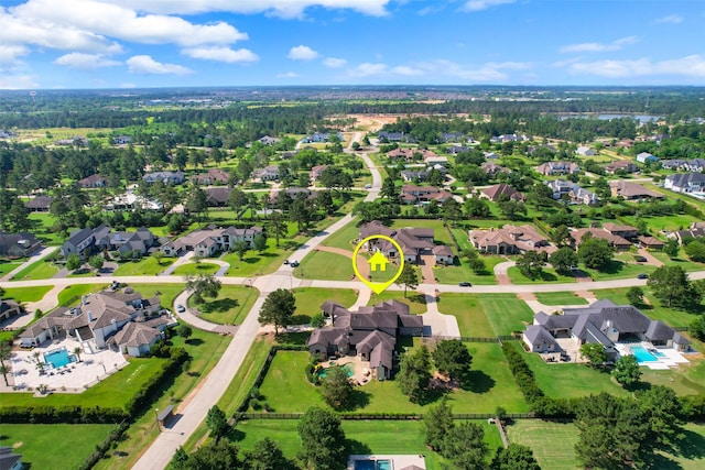 9 Copper Bottom Dr, Tomball, TX 77377 - aerial view of property's location with a pool area and nearby suburban area