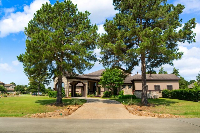 9 Copper Bottom Dr, Tomball, TX 77377 - view of front of house with a front yard