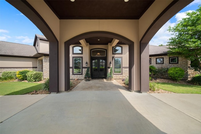 9 Copper Bottom Dr, Tomball, TX 77377 - property entrance featuring french doors, stone siding, and stucco siding