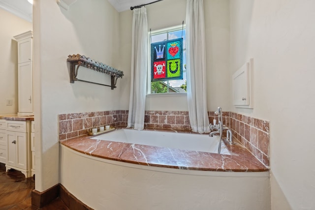 1915 Kirby Dr, Houston, TX 77019 - bathroom featuring a garden tub and vanity