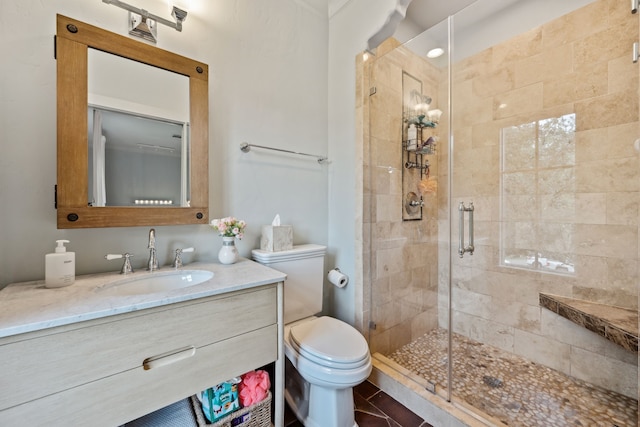 1915 Kirby Dr, Houston, TX 77019 - full bathroom featuring a stall shower, vanity, and toilet