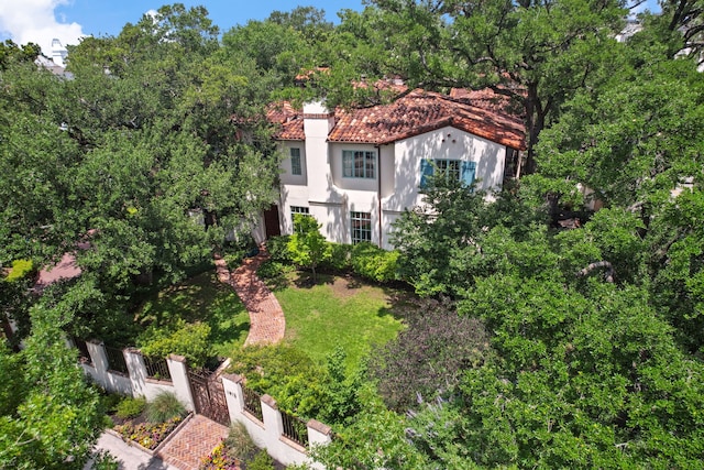 1915 Kirby Dr, Houston, TX 77019 - view of front of home featuring a tiled roof and stucco siding