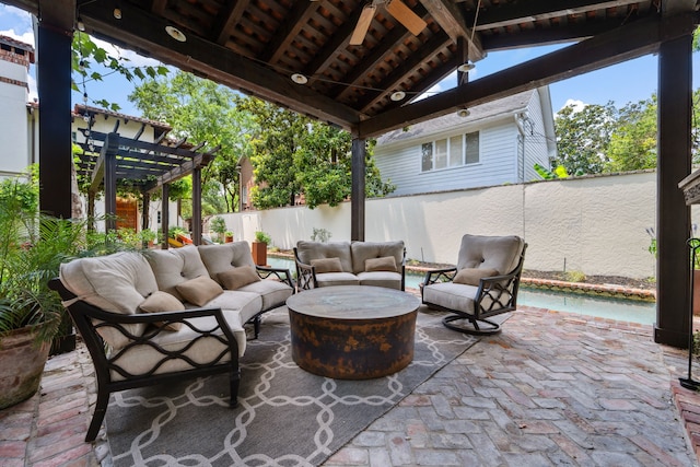 1915 Kirby Dr, Houston, TX 77019 - fenced backyard with outdoor lounge area and a pergola