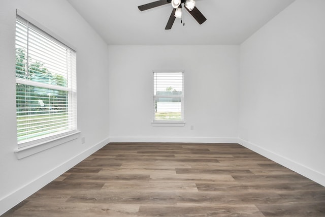 5046 Muske Ln, Brookshire, TX 77423 - unfurnished room with ceiling fan, wood finished floors, and baseboards