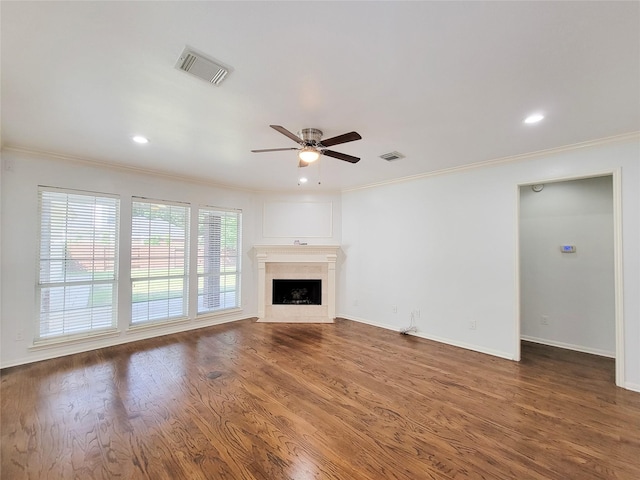 2927 Cambry Crossing Ct, Katy, TX 77494 - unfurnished living room with crown molding, a ceiling fan, wood finished floors, baseboards, and a fireplace with flush hearth