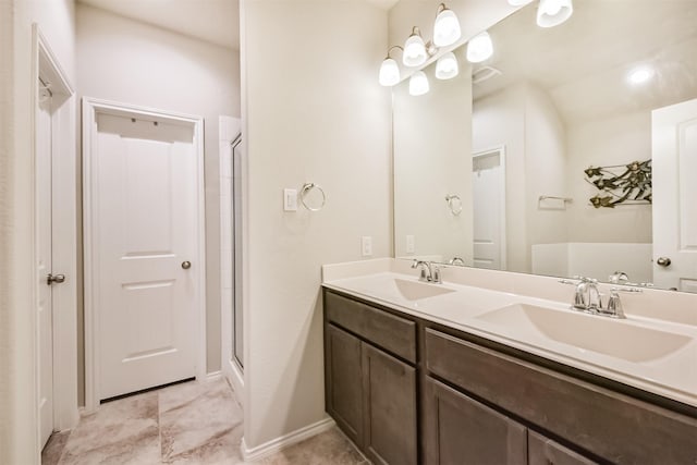 21579 Spear Valley Ln, Porter, TX 77365 - bathroom with double vanity, a stall shower, and baseboards