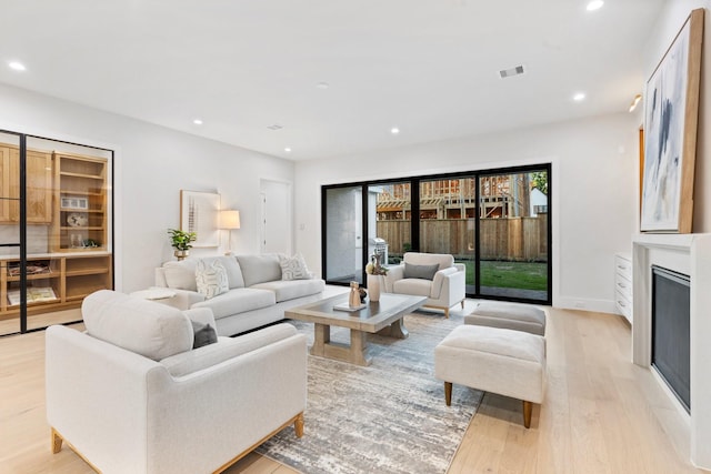 1526 Wakefield Dr, Houston, TX 77018 - living area with light wood-style flooring and recessed lighting