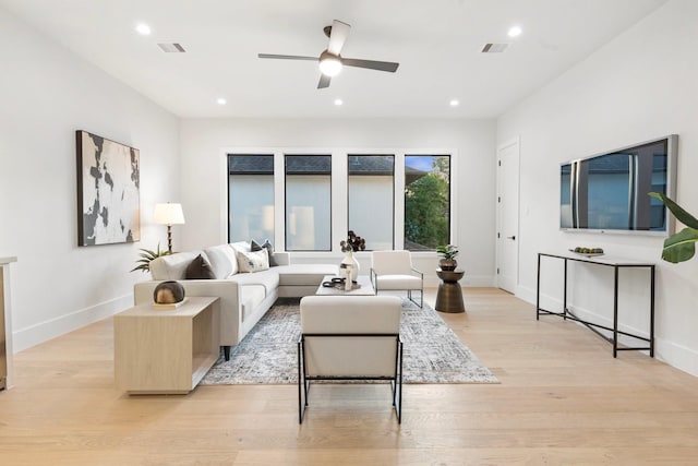 1526 Wakefield Dr, Houston, TX 77018 - living room with light wood finished floors, a ceiling fan, recessed lighting, and baseboards