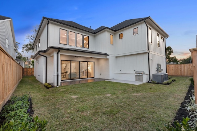 1526 Wakefield Dr, Houston, TX 77018 - back of house with cooling unit, ceiling fan, a patio area, and board and batten siding
