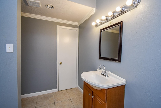 1102 Ashdale Dr, Sugar Land, TX 77498 - bathroom with crown molding, vanity, tile patterned floors, and baseboards