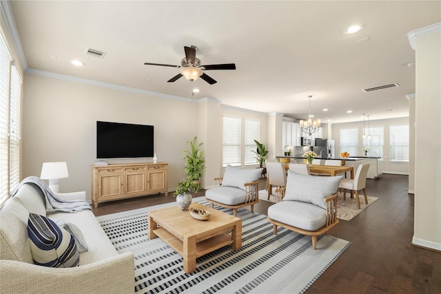 1511 Peyton Oaks Pl, Houston, TX 77043 - living area featuring a chandelier, ceiling fan, baseboards, recessed lighting, and dark wood-style flooring