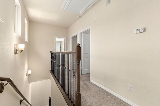 1511 Peyton Oaks Pl, Houston, TX 77043 - corridor featuring an upstairs landing, attic access, carpet, and baseboards