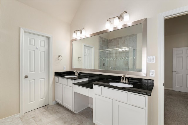 1511 Peyton Oaks Pl, Houston, TX 77043 - full bath featuring a shower stall, double vanity, lofted ceiling, and baseboards