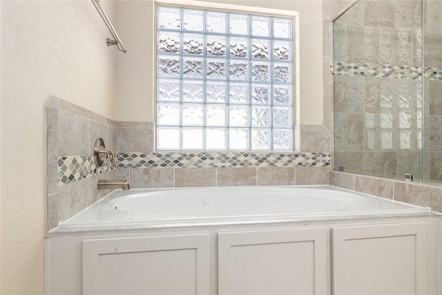 1511 Peyton Oaks Pl, Houston, TX 77043 - full bath with a garden tub and a textured wall
