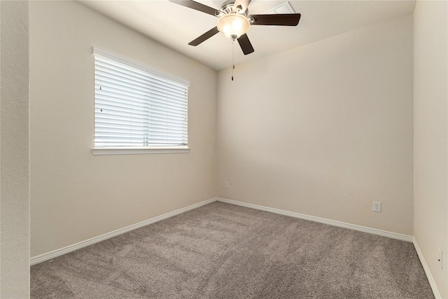 1511 Peyton Oaks Pl, Houston, TX 77043 - spare room featuring carpet floors, baseboards, and a ceiling fan