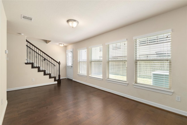 1511 Peyton Oaks Pl, Houston, TX 77043 - foyer entrance with baseboards, dark wood finished floors, and stairway