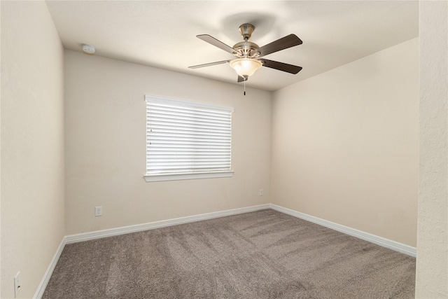 1511 Peyton Oaks Pl, Houston, TX 77043 - unfurnished room featuring a ceiling fan, carpet flooring, a smoke detector, and baseboards