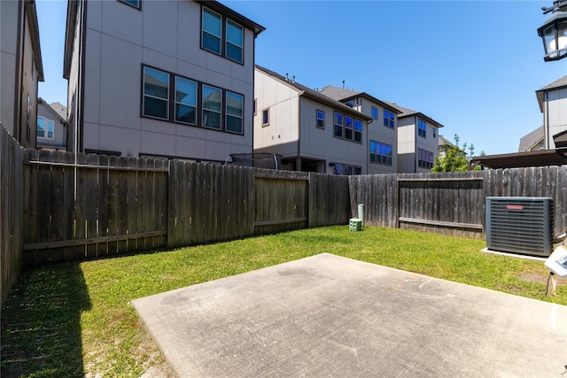1511 Peyton Oaks Pl, Houston, TX 77043 - view of yard with central AC unit, a patio area, and a residential view