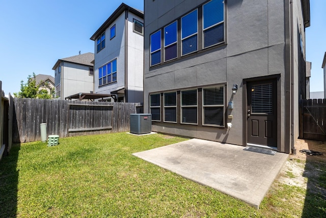 1511 Peyton Oaks Pl, Houston, TX 77043 - view of yard featuring central AC and a patio