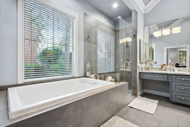 1714 Chestnut Grove Ln, Houston, TX 77345 - full bath with vanity, a bath, a stall shower, tile patterned floors, and crown molding