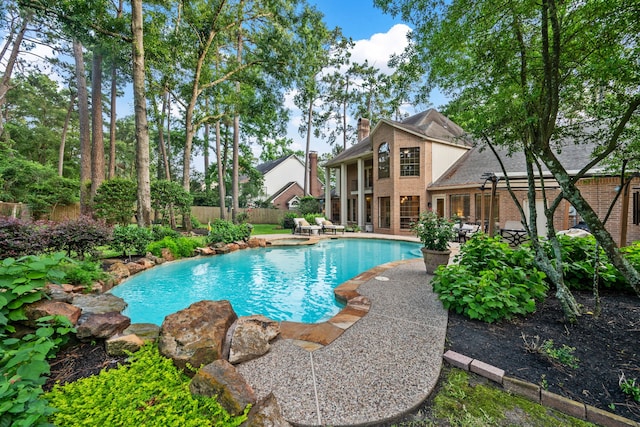 1714 Chestnut Grove Ln, Houston, TX 77345 - view of pool with a fenced backyard and a patio area
