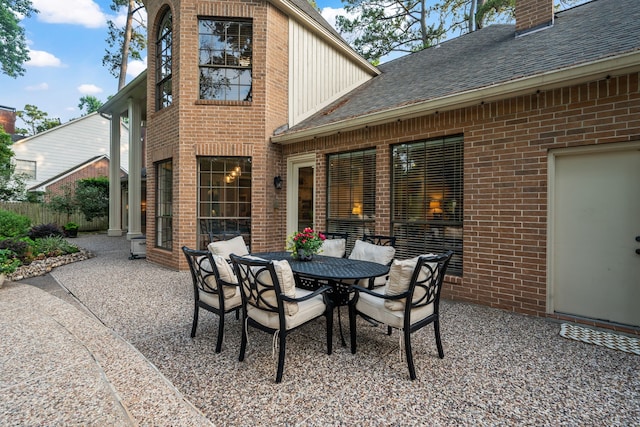 1714 Chestnut Grove Ln, Houston, TX 77345 - view of patio featuring outdoor dining area