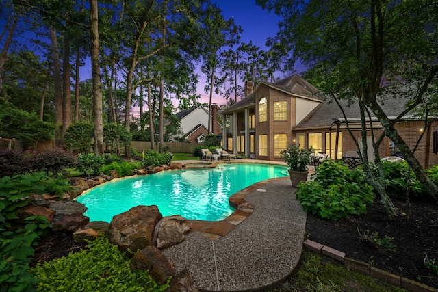 1714 Chestnut Grove Ln, Houston, TX 77345 - view of swimming pool with a patio