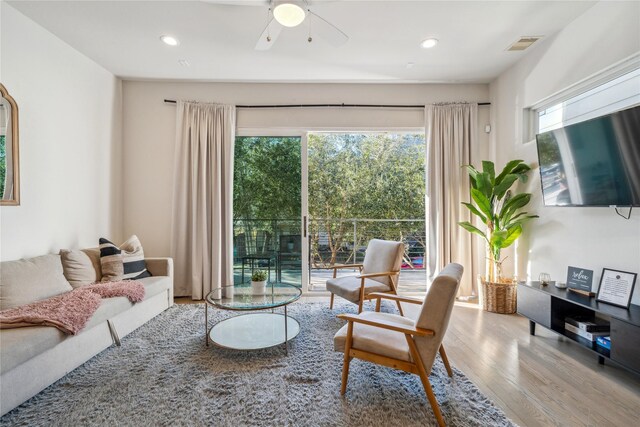 2809 St Emanuel St, Houston, TX 77004 - living room featuring wood finished floors, healthy amount of natural light, recessed lighting, and a ceiling fan