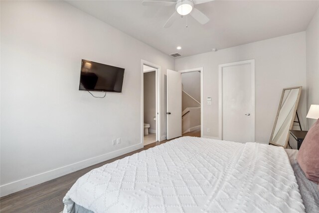 2809 St Emanuel St, Houston, TX 77004 - bedroom with baseboards, dark wood-style floors, connected bathroom, and ceiling fan