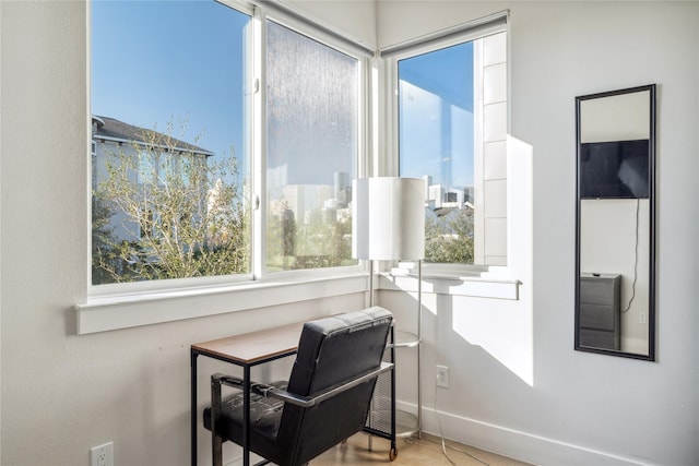 2809 St Emanuel St, Houston, TX 77004 - living area with healthy amount of natural light, baseboards, and an office area