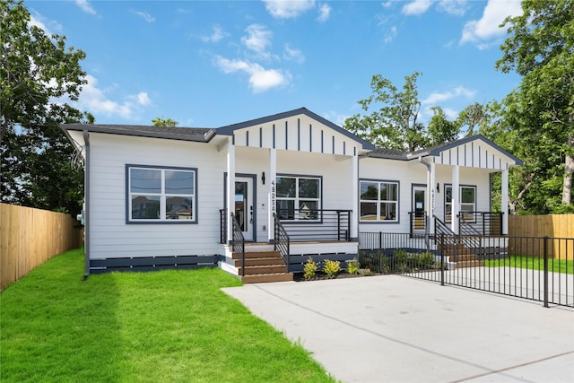 4825 Pederson St A/B, Unit A/B Houston, TX 77033 - view of front of house with board and batten siding