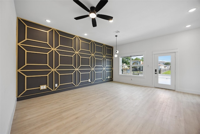 4825 Pederson St A/B, Unit A/B Houston, TX 77033 - unfurnished room with wood finished floors, baseboards, recessed lighting, and a ceiling fan