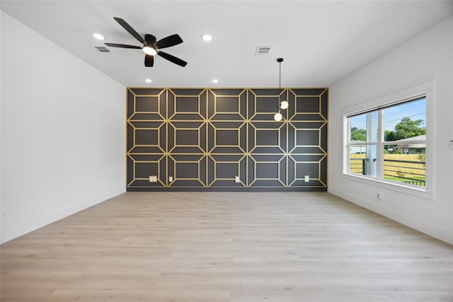 4825 Pederson St A/B, Unit A/B Houston, TX 77033 - unfurnished room with wood finished floors, a ceiling fan, recessed lighting, and baseboards