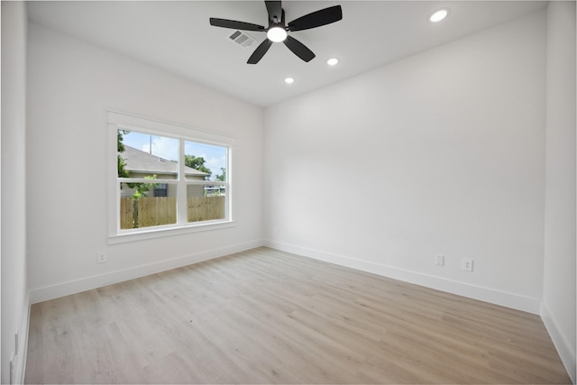 4825 Pederson St A/B, Unit A/B Houston, TX 77033 - spare room with light wood-style floors, baseboards, recessed lighting, and ceiling fan