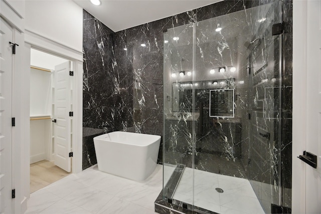 4825 Pederson St A/B, Unit A/B Houston, TX 77033 - full bath featuring a freestanding tub, a marble finish shower, tile walls, marble finish floors, and recessed lighting