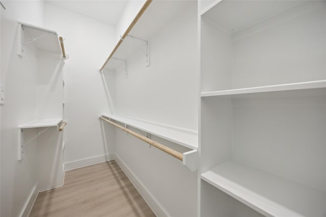 4825 Pederson St A/B, Unit A/B Houston, TX 77033 - walk in closet featuring light wood-style floors
