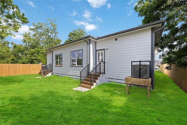 4825 Pederson St A/B, Unit A/B Houston, TX 77033 - back of house with entry steps and central air condition unit