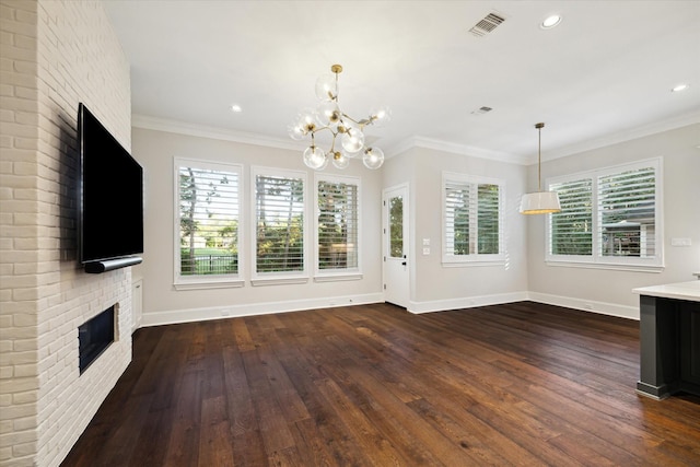 183 Timber Mill St, The Woodlands, TX 77380 - unfurnished living room featuring a brick fireplace, a chandelier, dark wood-type flooring, baseboards, and recessed lighting