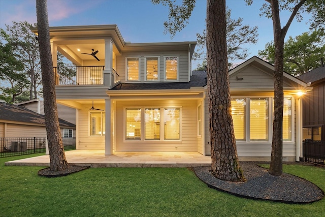 183 Timber Mill St, The Woodlands, TX 77380 - rear view of property featuring a balcony and a patio area