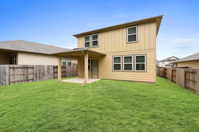 7051 Silverleaf Oak St, Conroe, TX 77304 - back of house featuring a patio area and board and batten siding