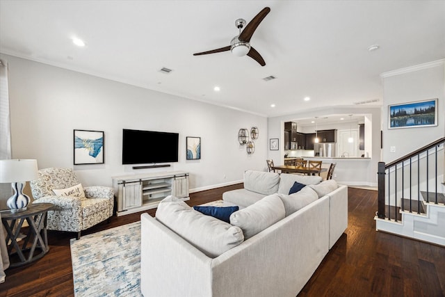 3715 Oakroc Grv, Houston, TX 77018 - living room featuring a ceiling fan, crown molding, dark wood-type flooring, stairs, and baseboards