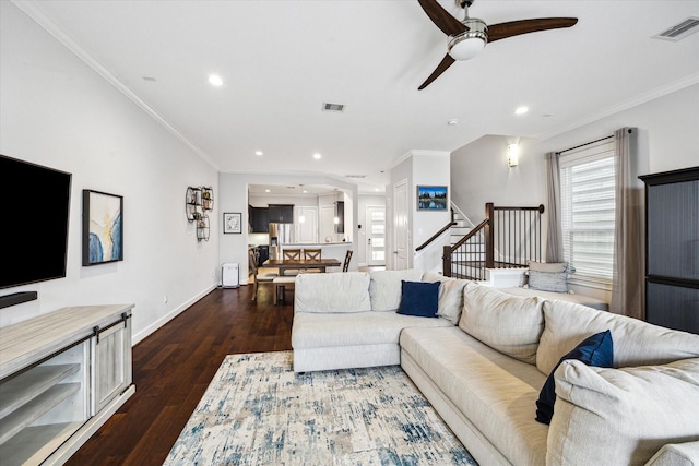 3715 Oakroc Grv, Houston, TX 77018 - living area featuring a ceiling fan, dark wood-style floors, ornamental molding, recessed lighting, and stairway