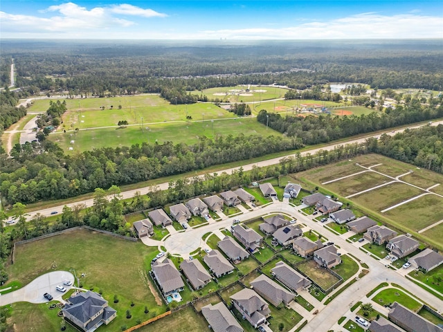 1505 Mirador Dr, Conroe, TX 77301 - aerial overview of property's location featuring nearby suburban area and a heavily wooded area