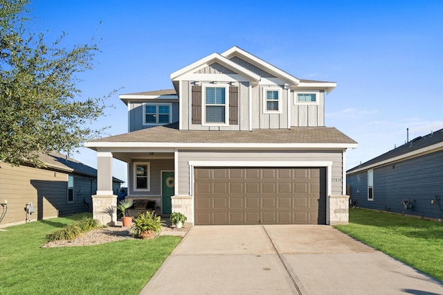 17810 Planted Orchard Dr, Hockley, TX 77447 - craftsman inspired home featuring a garage, concrete driveway, a front lawn, board and batten siding, and a porch