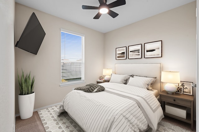 17810 Planted Orchard Dr, Hockley, TX 77447 - bedroom with carpet, multiple windows, baseboards, and a ceiling fan